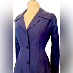 Prada’s full-length jacket has a beautiful bodice. Beautiful drape. A must-have.